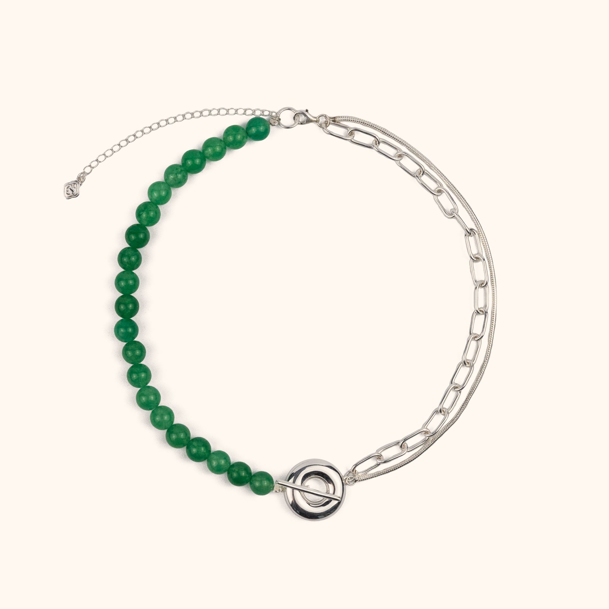 The Heaven and Earth necklace is a modern Chinese necklace with aventurine beads, silver mixed chain, and donut toggle clasp. It is a versatile modern Asian jewelry piece with a jade aesthetic that can be worn as a necklace or two bracelets.