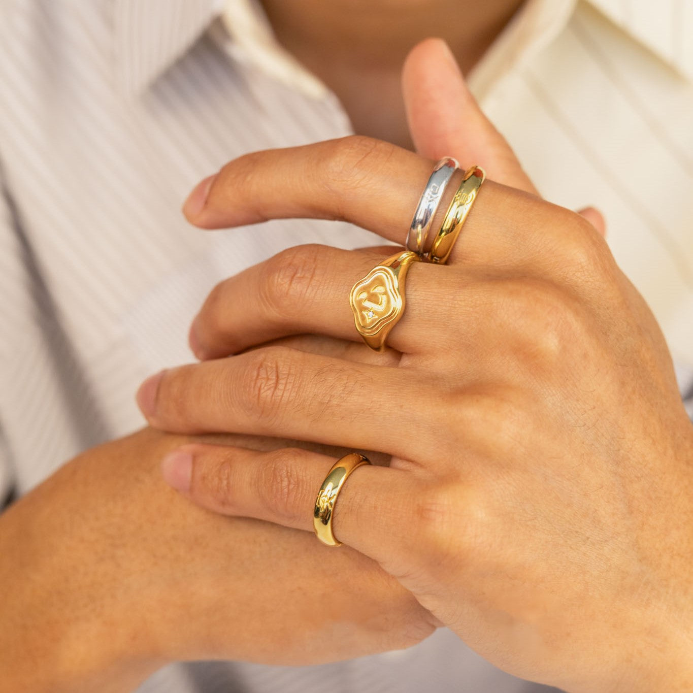 Modern, minimal Chinese jewelry and rings in both silver and gold.