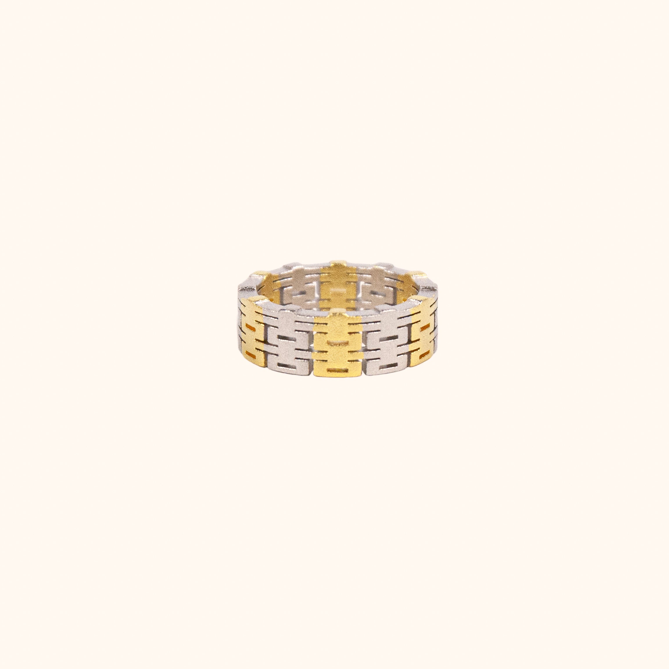 A two-tone, modern Chinese-inspired ring made of the Chinese happiness character, set on a white background.