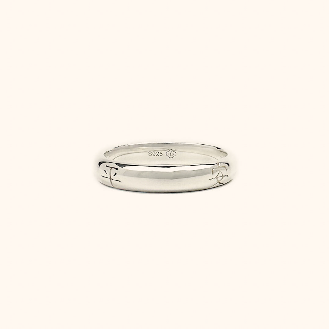 Well Wishes Band ring in sterling silver. A modern and minimal Chinese ring engraved with 平安如意 - a well wish for peace, safety, and good fortune.